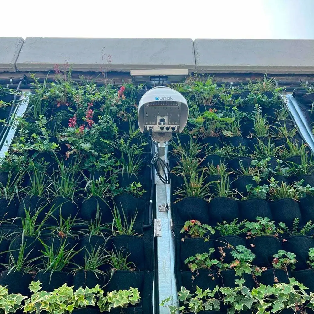 Kunak AIR Pro air quality station installed on one of the vertical gardens in the Calle 30 Natura project in Madrid - Kunak